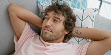man who works physical labor job relaxing after work 