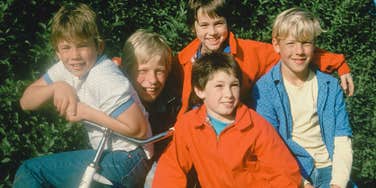 group of boys in the 1970s outside together