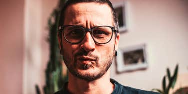 man lacking empathy looking annoyed and confused