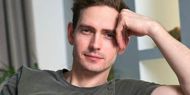 Emotionally mature man looks kindly at the camera