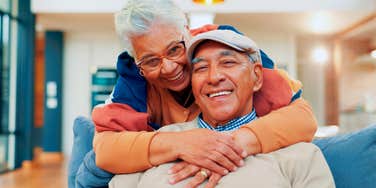 older couple deeply in love smiling together