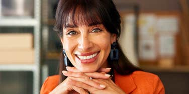 professional woman smiling in the workplace