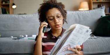 young woman worried about being frugal