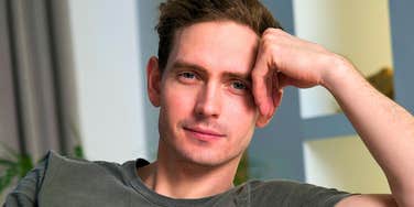 low-iq man looking arrogant and smiling