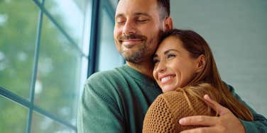 couple in a happy relationship hugging