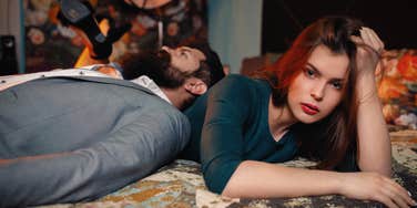 couple feeling resentful of each other looking serious