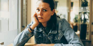 highly sensitive woman thinking deeply feeling uncomfortable
