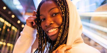 young woman born after 2000s smiling