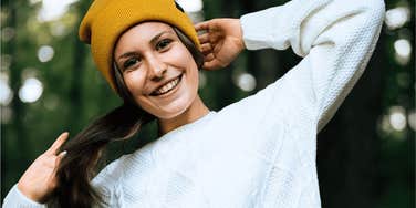 Neurodivergent young woman who is happy outdoors