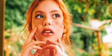 confused woman lacking self-awareness outside