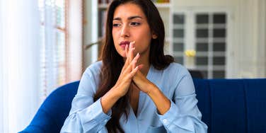 sad adult woman not reaching out to parents for advice