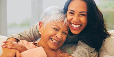 adult woman happy to come home to visit her mom