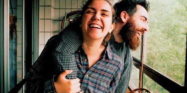 happy couple with woman feeling secure with her husband