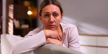 woman raised in the 60s and 70s feeling stressed in middle age