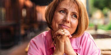 middle aged woman thinking about her values