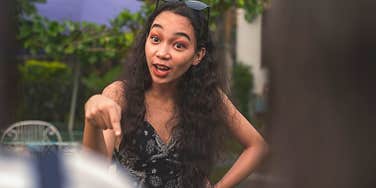 Woman who is a fake friend acting jealous 