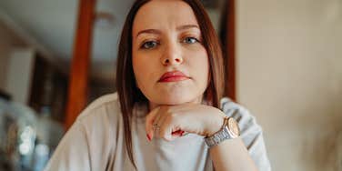 woman who is losing her mental and emotional capacity looks stressed 
