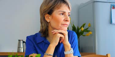 nostalgic gen X woman feeling sentimental about the past