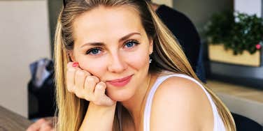 Her warm, knowing smile is the kind of gentle charm that gets exactly what it wants.