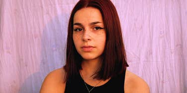 compassionate woman looking annoyed and offended