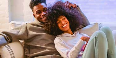 happy young couple spending quality time together at home