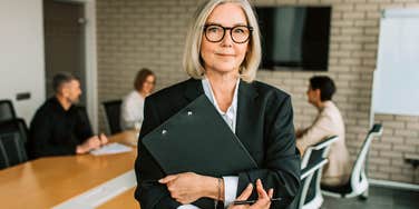 boomer woman in the office defining her work boundaries
