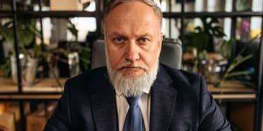stressed out professional boomer enduring toxic workplace rules