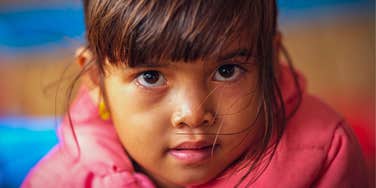 sad little girl with unsupportive parents