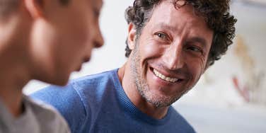 man who is good at conversation listens to someone speak
