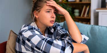 woman experiencing cognitive overload feeling stressed