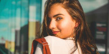 confident woman with high self-esteem turning around