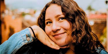 emotionally and mentally impressive woman smiling