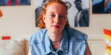 young woman in her bedroom not conforming to values of the past