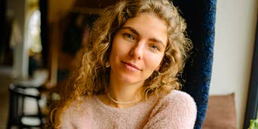 intelligent woman smiling about to talk