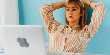 burnt out exhausted worker feeling stressed in the office