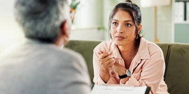 woman who is running out of money talking to her boss 