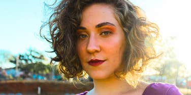 fake woman about to gossip behind friend's back