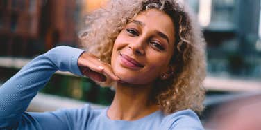 happy millennial woman with a different approach to life