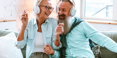 boomer couple listening to love songs from the 1980s