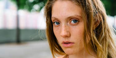 emotionally draining woman looking serious and upset