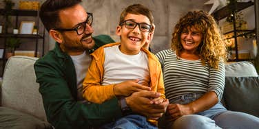 parents and child spending time bonding at home