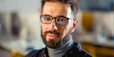 man lacking intuitiveness staring seriously