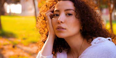 woman outside fed up with people who won't help themselves