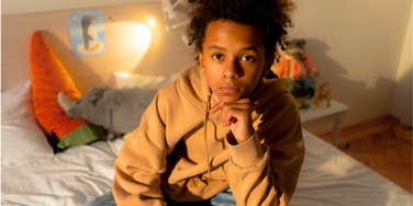 lonely kid in his room dealing with immature parents