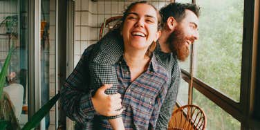 happy couple laughing together being good partners