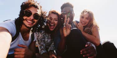group of friends posing in selfie