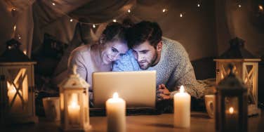 couple watching movie on laptop
