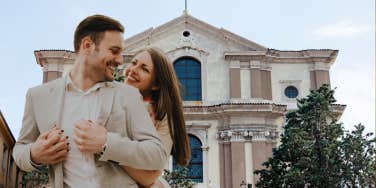 Couple in front of church 