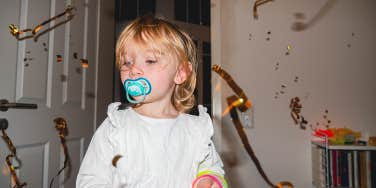 toddler with pacifier 