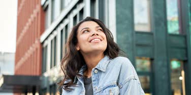 Confident happy beautiful young hipster African American woman